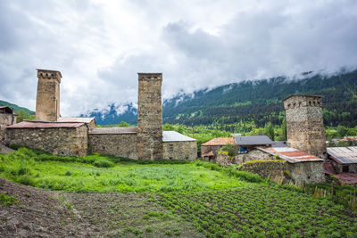 Old building against cloudy sky