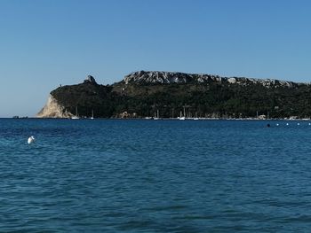 Scenic view of sea against clear sky