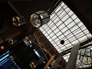 Low angle view of illuminated ceiling at railroad station