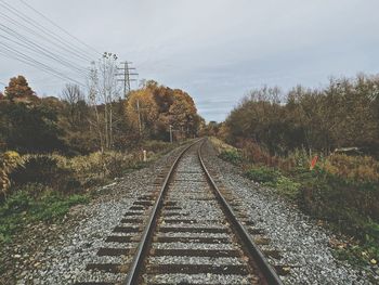 Railroad track on countryside landscape