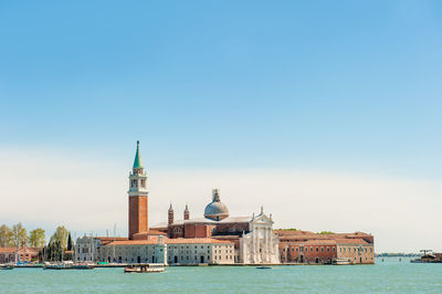 St mark square by grand canal against sky