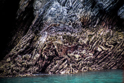 View of rock formation in sea