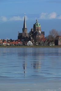 View of church in city at waterfront