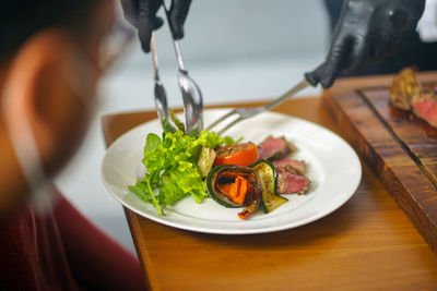 Close-up of food in plate on table