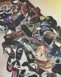 Full frame shot of shoes on tiled floor