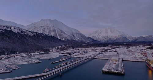 Scenic view of snowcapped mountains against sky during winter