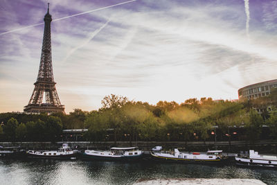 Scenic view of river against cloudy sky