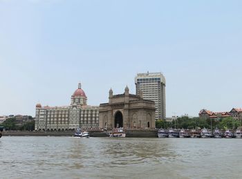 Buildings in distance with waterfront