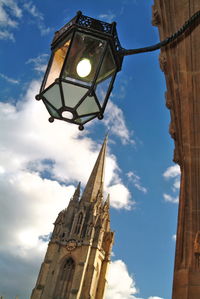 Low angle view of street light against sky