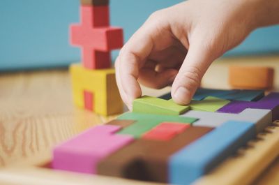 Close-up of hand holding toy
