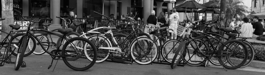 Bicycles parked on street in city