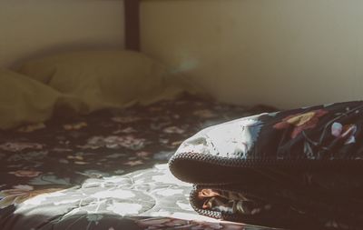 Close-up of lying down on bed