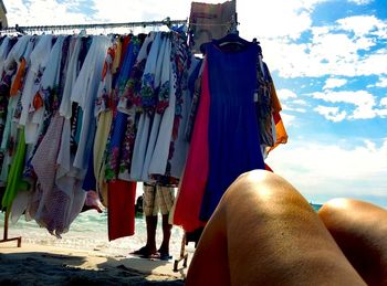 Clothes hanging in the dark