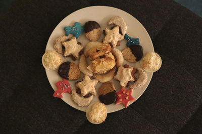 High angle view of cookies in plate on table