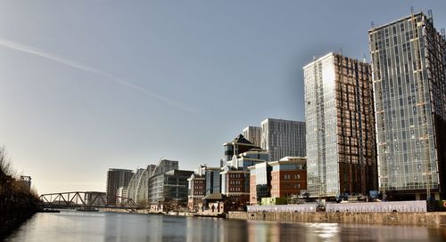 Modern buildings in city against sky