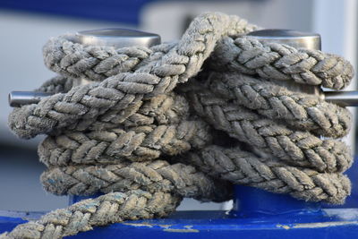 Close-up of ropes tied on cleat