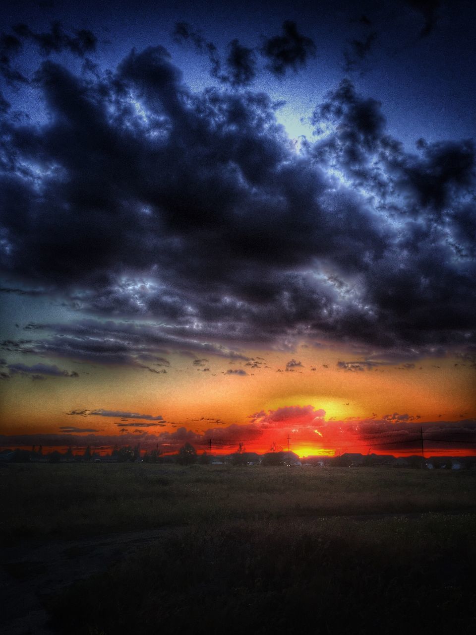 sunset, sky, scenics, cloud - sky, beauty in nature, tranquil scene, tranquility, dramatic sky, orange color, cloudy, nature, landscape, weather, idyllic, atmospheric mood, silhouette, cloud, cloudscape, overcast, moody sky