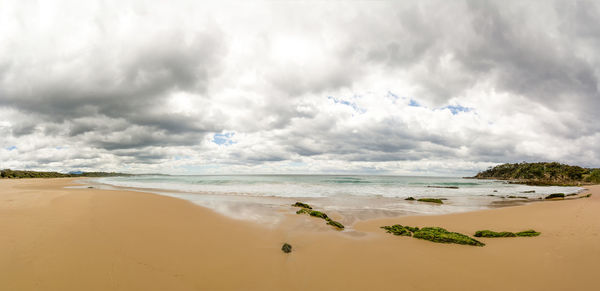 Scenic view of beach against sky