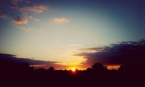 Scenic view of dramatic sky during sunset