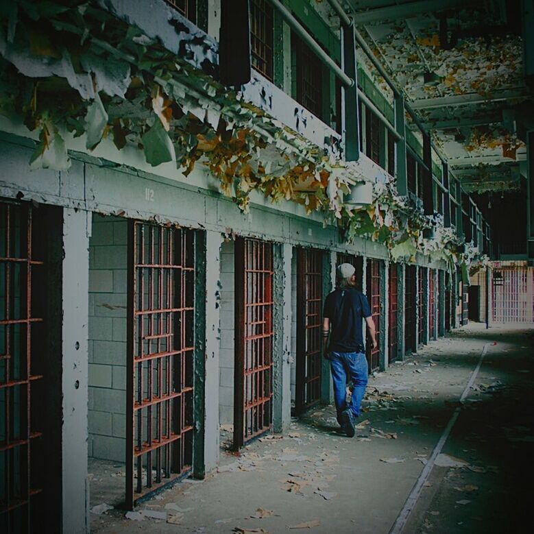 building exterior, architecture, built structure, full length, walking, men, lifestyles, rear view, street, city, person, building, leisure activity, casual clothing, standing, outdoors, day, sidewalk