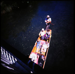 High angle view of people on boat in lake