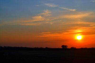 Scenic view of silhouette landscape against sky during sunset