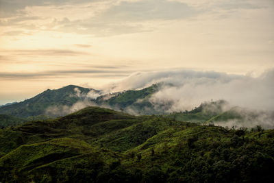 Scenic view of mountains against sky during sunset