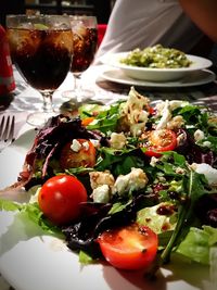 Close-up of tomatoes in plate on table
