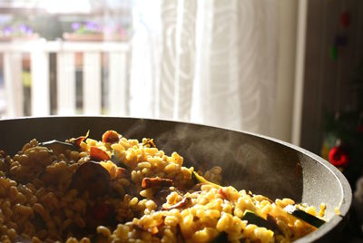 Close-up of paella on table