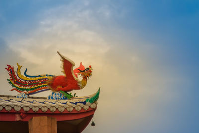 Low angle view of a statue against the sky