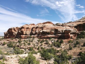 Scenic view of cliff against sky