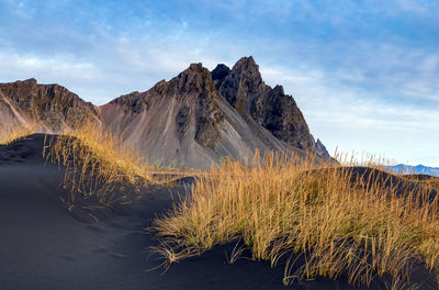 Scenic view of rock mountains against sky