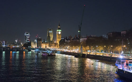 Illuminated buildings at waterfront