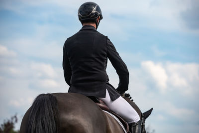 Horse jumping, equestrian sports, show jumping competition themed photograph.