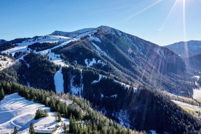 Scenic view of snowcapped mountains against sky