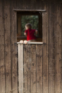 Small child in a treehouse