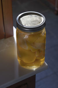 Close-up of glass of jar on table