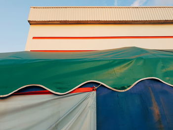 Low angle view of roof against sky