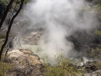 Smoke emitting from volcanic mountain