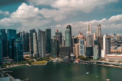 Modern buildings in city against sky in singapore