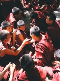 High angle view of teenage monks