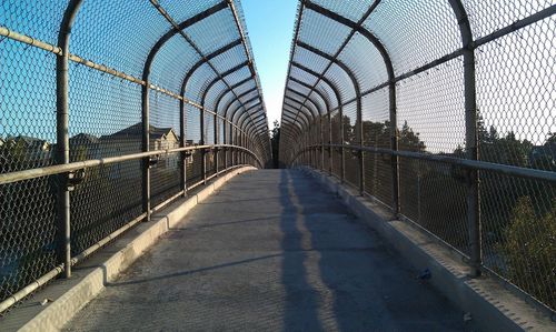 Empty bridge during sunny day