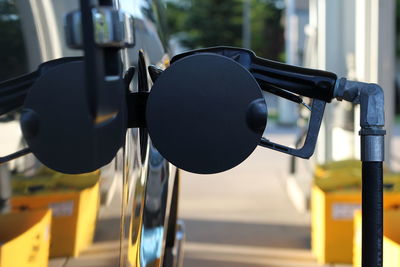 Refueling vehicle at gas station