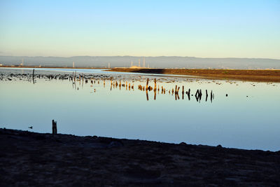 Scenic view of lake against clear sky