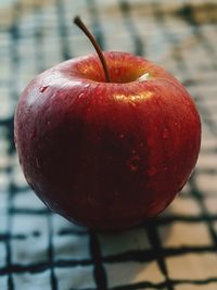 Close-up of wet apple in water