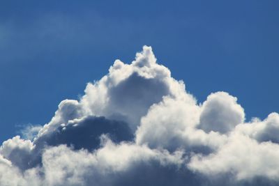 Low angle view of clouds in blue sky