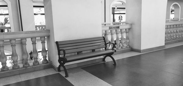 Empty bench in building