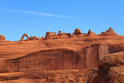 Rock formations against blue sky