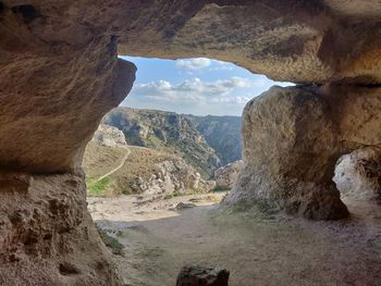 Scenic view of rock formation against sky