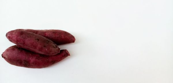 Close-up of strawberry against white background